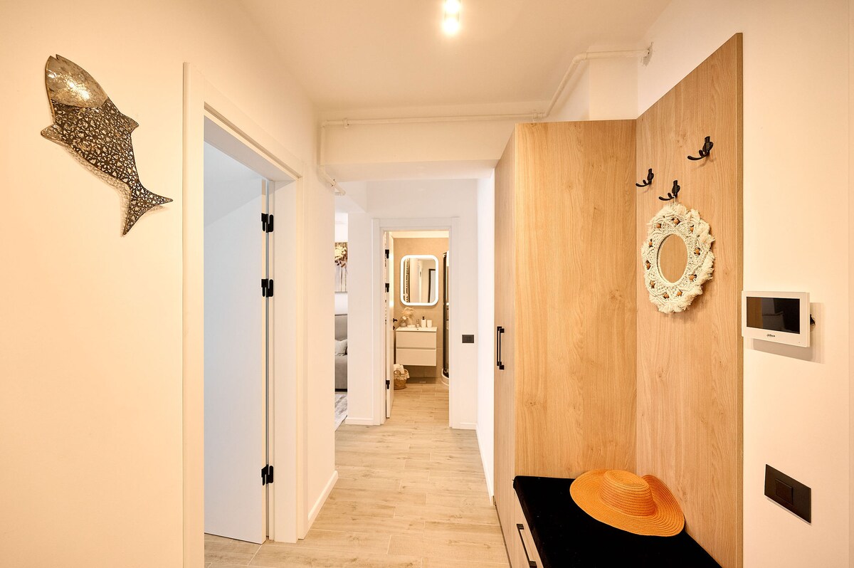 Sea la Vie Apt 240 in Infinity Beach Resort - parking — Διαμέρισμα — κατάλυμα διακοπών στο Infinity Resort & SPA, Mamaia Nord, Κωνστάντζα, Ρουμανία — φωτογραφία 7 του καταλύματος | Aqua Vista Rentals