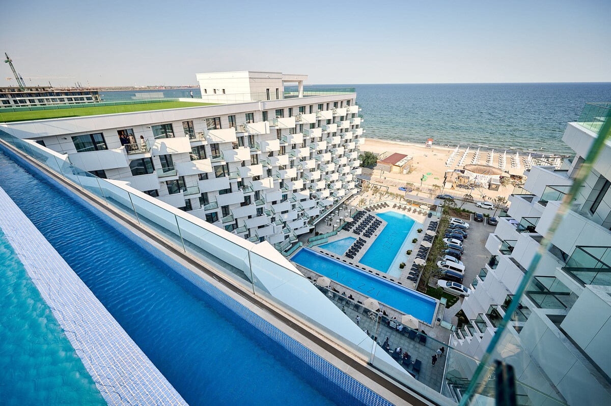 Infinity Summer Crib Beach Resort - parking — Διαμέρισμα — κατάλυμα διακοπών στο Infinity Resort & SPA, Mamaia Nord, Κωνστάντζα, Ρουμανία — φωτογραφία 4 του καταλύματος | Aqua Vista Rentals