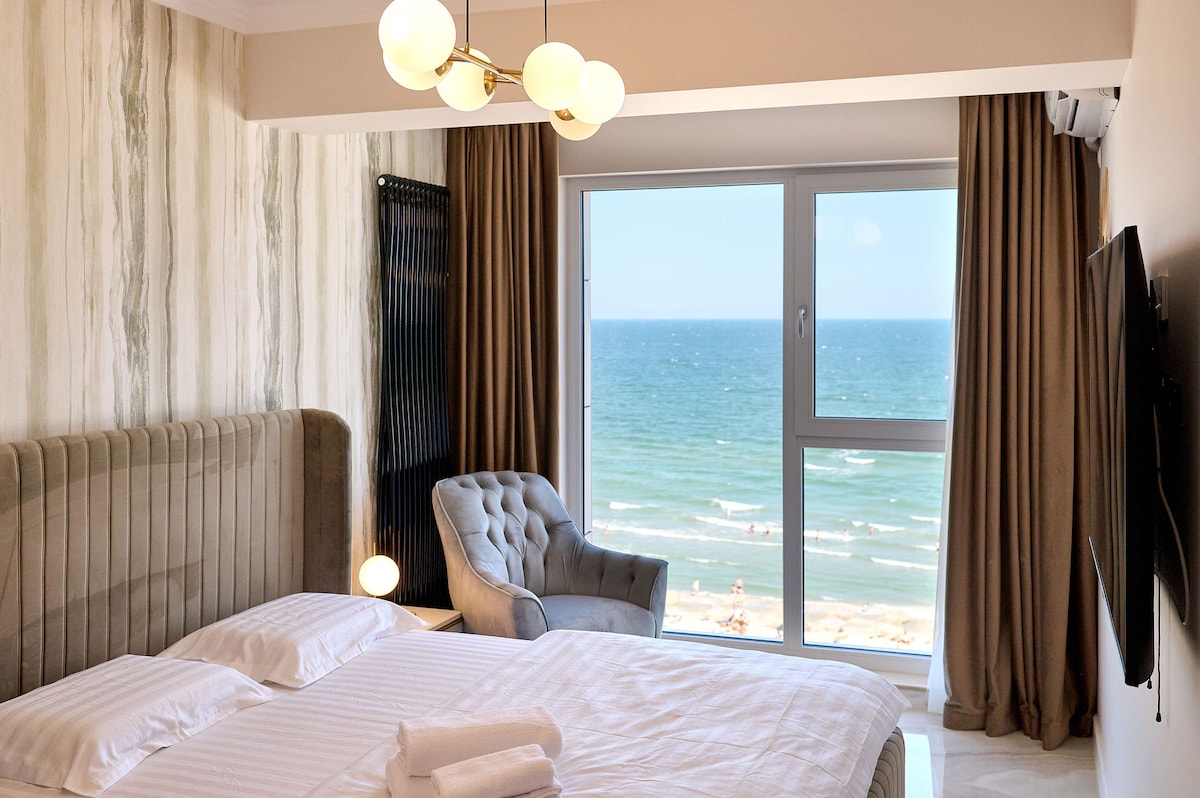 Beach Bliss Apartment in Infinity Beach Resort parking — Διαμέρισμα — κατάλυμα διακοπών στο Infinity Resort & SPA, Mamaia Nord, Κωνστάντζα, Ρουμανία — κύρια φωτογραφία του καταλύματος | Aqua Vista Rentals
