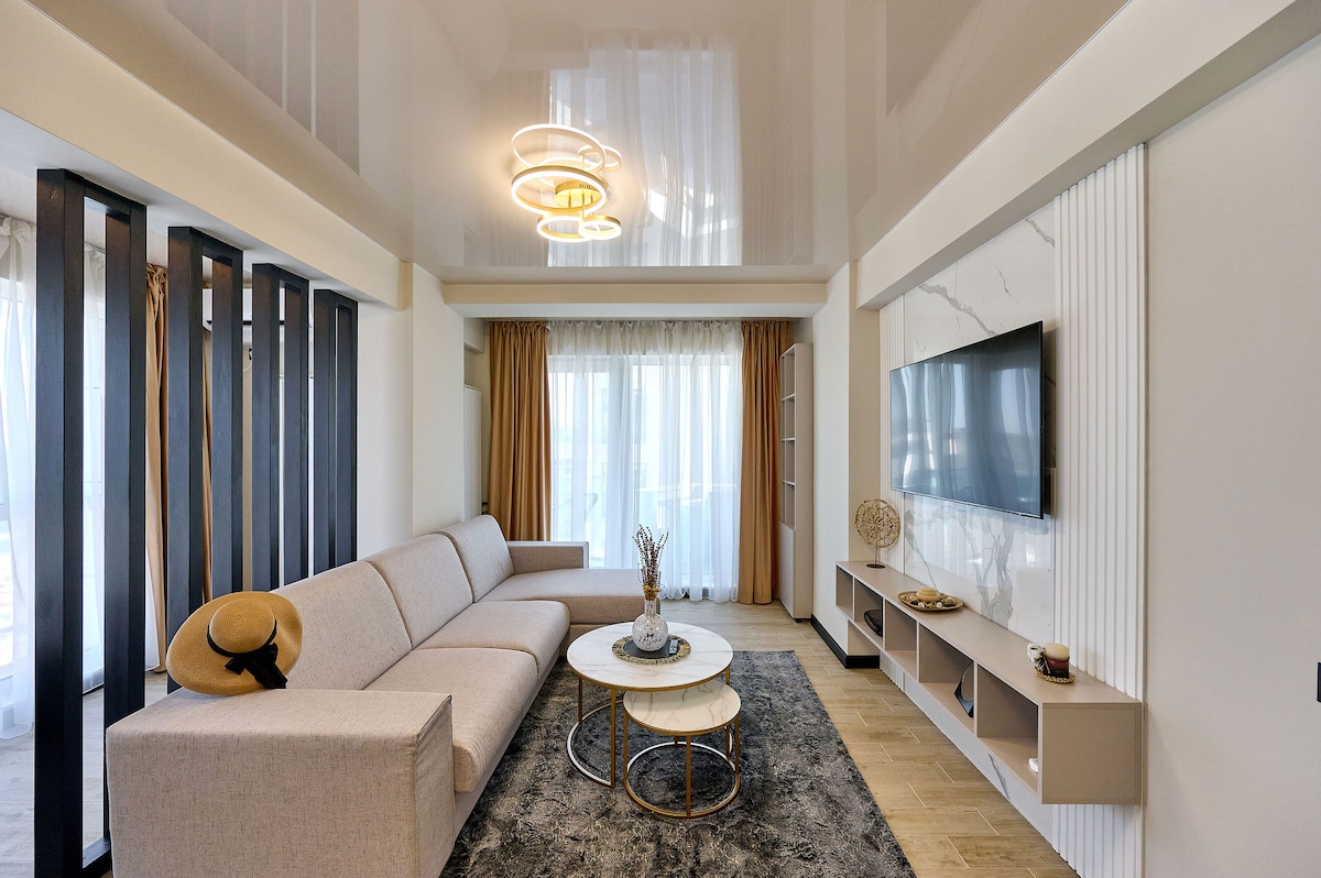 Smarald Sea View Apartment in Infinity Beach Resort - parking — Διαμέρισμα — κατάλυμα διακοπών με θέα στη θάλασσα στο Infinity Resort & SPA, Mamaia Nord, Κωνστάντζα, Ρουμανία — φωτογραφία 2 του καταλύματος | Aqua Vista Rentals