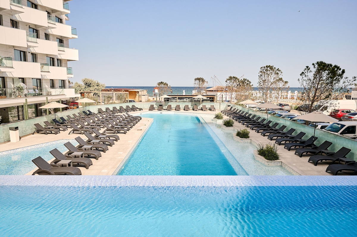Smarald Sea View Apartment in Infinity Beach Resort - parking — Διαμέρισμα — κατάλυμα διακοπών με θέα στη θάλασσα στο Infinity Resort & SPA, Mamaia Nord, Κωνστάντζα, Ρουμανία — φωτογραφία 8 του καταλύματος | Aqua Vista Rentals